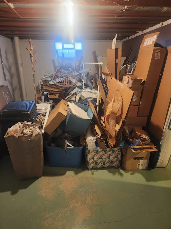 Roll-off dumpster container at job site for 6 Yard Dumpster Rental in Harpswell